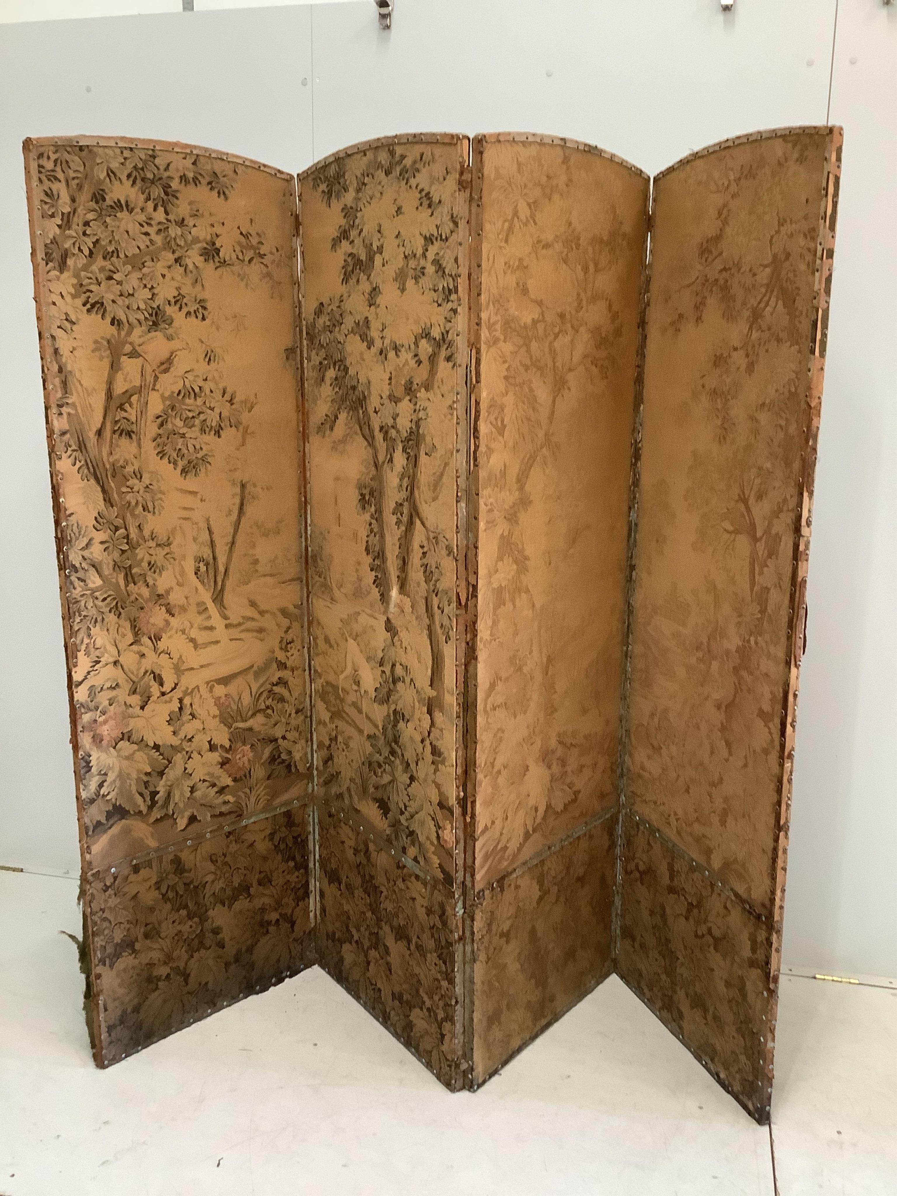 A four fold machine tapestry screen, each panel width 60cm, height 198cm. Condition - poor